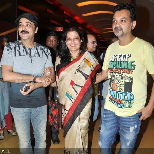 Moushumi Chatterjee accompanied by Prosenjit Chatterjee and director Srijit Mukherjee (R) during the premiere of Bengali movie Mishawr Rahasya, held at Cinemax, in Mumbai, on October 9, 2013. (Pic: Viral Bhayani)