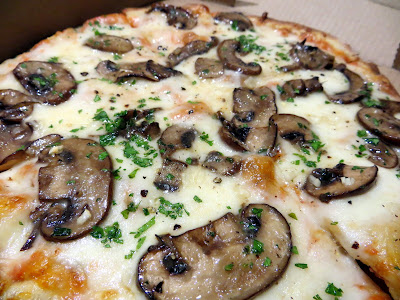 Pulehu Pizza Truffle Oil Mushroom pizza, with Freshly sautéed baby bella Mushrooms, fresh Garlic, Ricotta cheese, White Truffle Oil & fresh cracked Black Pepper, Portland food truck grilled pizza