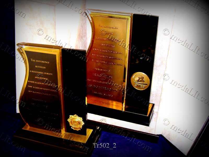 Luxury Trophy. Combination of engraved plated, medals and acrylics.