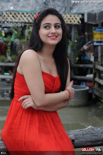 Aksha looks hot in a red dress during a photoshoot.www.galleryrub.com <br /> 