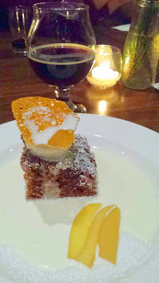 Dessert, a Black Sticky Gingerbread with quince sorbet, ginger tuile, poached quince and warm sweet cream poured tableside at the Raven and Rose and Goose Island Brewers' Dinner Series event on December 7, 2014. Paired with the Bourbon County Barleywine