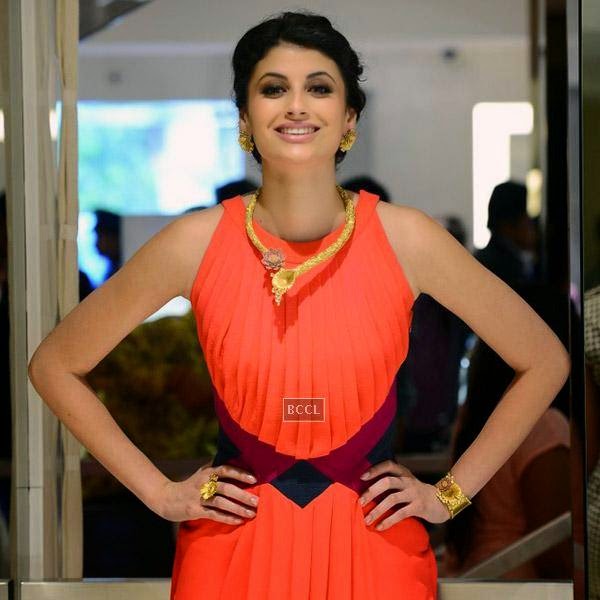 A model gets clicked during a high tea hosted by Nisha Jamwal and Veda Raheja, at Zoya on July 24, 2014.(Pic: Viral Bhayani)