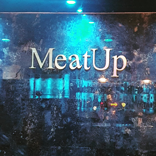 MeatUp Restaurant logo