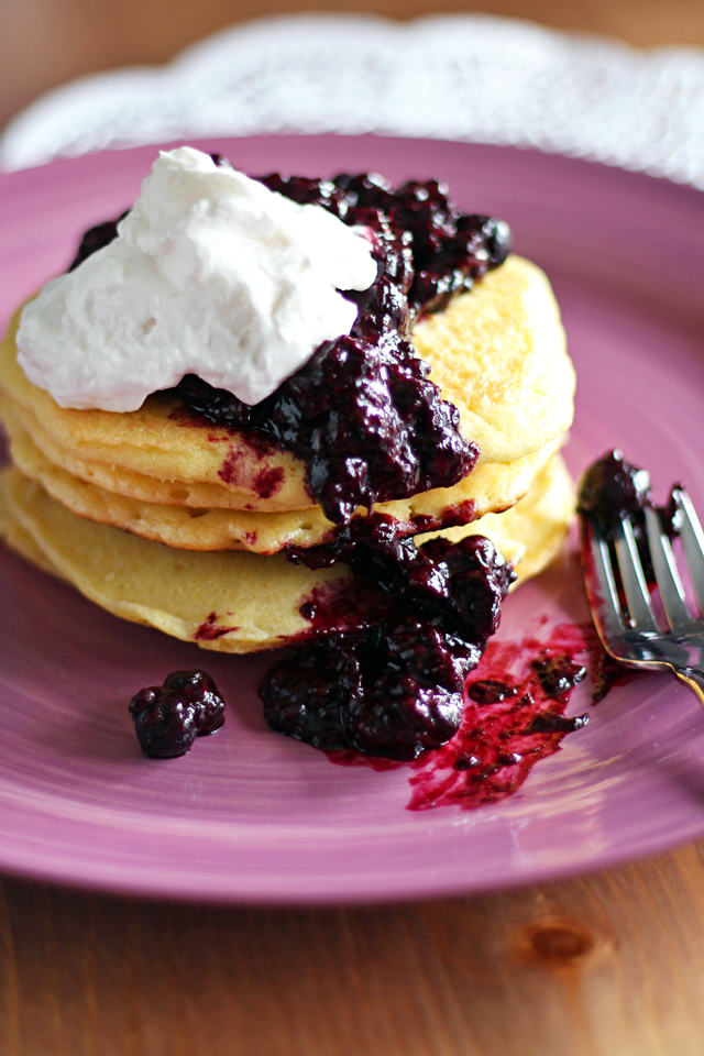 Almond Meal Pancakes with Berry Reduction and Coconut Cream from dontmissdairy.com