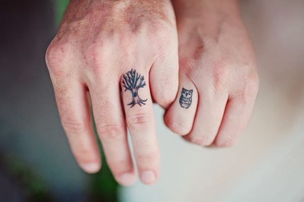 http://www.tattooideastoppicks.com/2013/09/if-you-were-a-bird-then-id-be-a-tree-and-you-would-come-home-my-darling-to-me-wedding-ring-tattoos/