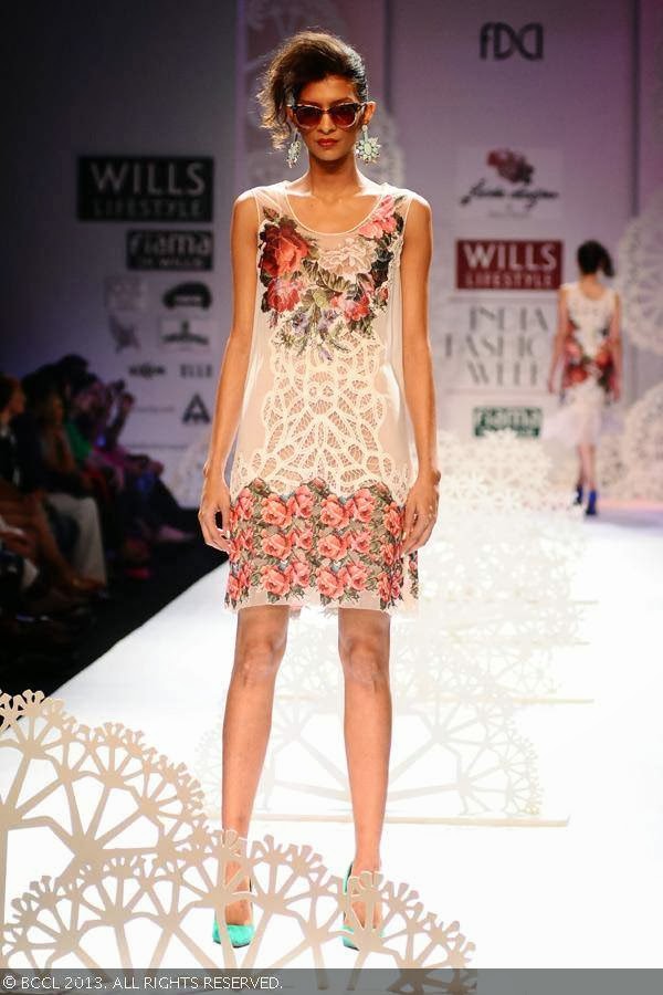 Lekha walks the ramp for fashion designer duo Paras and Shalini on Day 1 of the Wills Lifestyle India Fashion Week (WIFW) Spring/Summer 2014, held in Delhi.