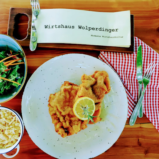 Wirtshaus Wolperdinger | Deutsches Restaurant - Biergarten