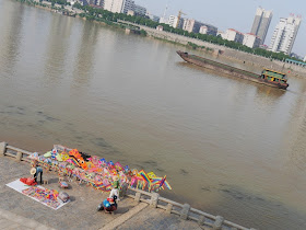 kites for sale next to the Xiang River in Hengyang