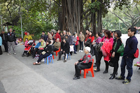 crowd watching performance of Chinese opera in Guangzhou