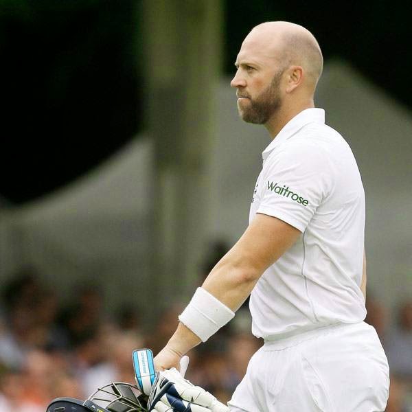 England's Matt Prior leaves the field after being caught by India's Shikhar Dhawan off the bowling of Mohammed Shami during the third day of the second test match between England and India at Lord's cricket ground in London, Saturday, July 19, 2014.