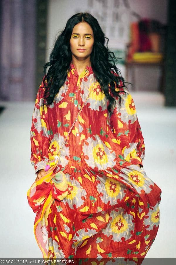 A model flaunts a creation by fashion designer Anupama Dayal on Day 1 of Wills Lifestyle India Fashion Week (WIFW) Spring/Summer 2014, held in Delhi.