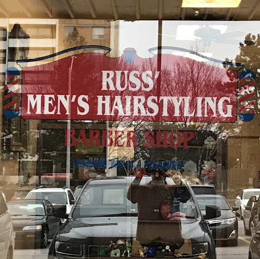 Russ mens hairstyling/barbershop logo