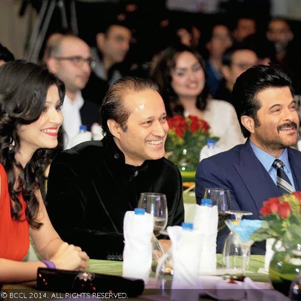 Times Group MD Vineet Jain with Anil Kapoor and Divya Mishra finalist fbb Femina Miss India Delhi 2014 at the book launch party of Times Food and Nightlife Guide, Delhi, 2014, held at hotel ITC Maurya, New Delhi, on January 27, 2014.