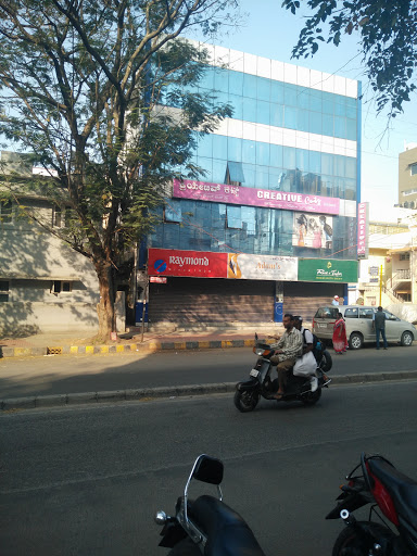 Raymond Store, S End E Cross Rd, Phase II, Jayanagara 9th Block, JP Nagar, Bengaluru, Karnataka 560078, India, Fabric_Shop, state KA