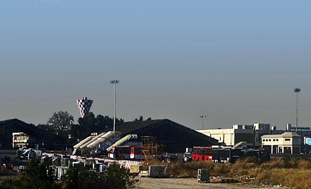 aircraft hangar with buses