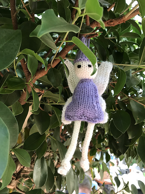 knit fairy doll in tree