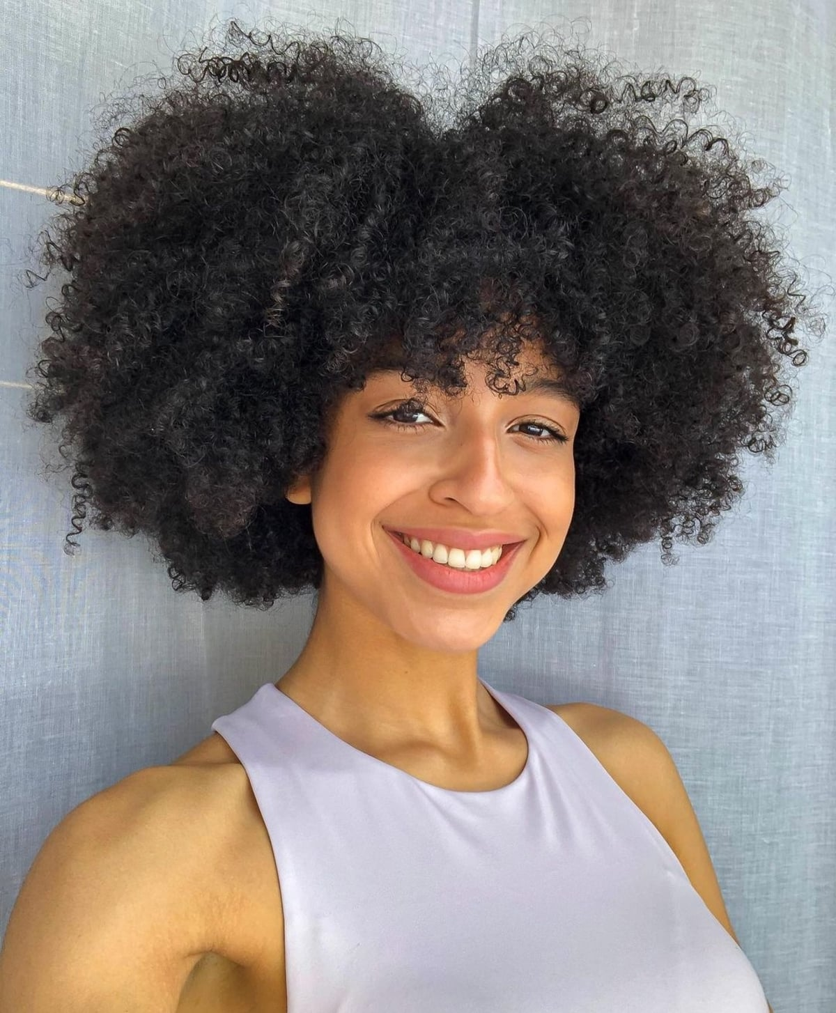 Afro with bangs