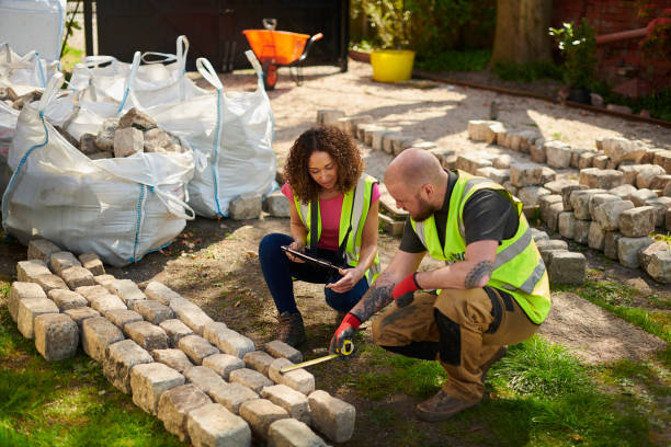 two engineers working on landscaping on a property in Lagos
