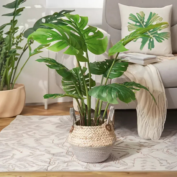 Artificial green plant with rattan design base
