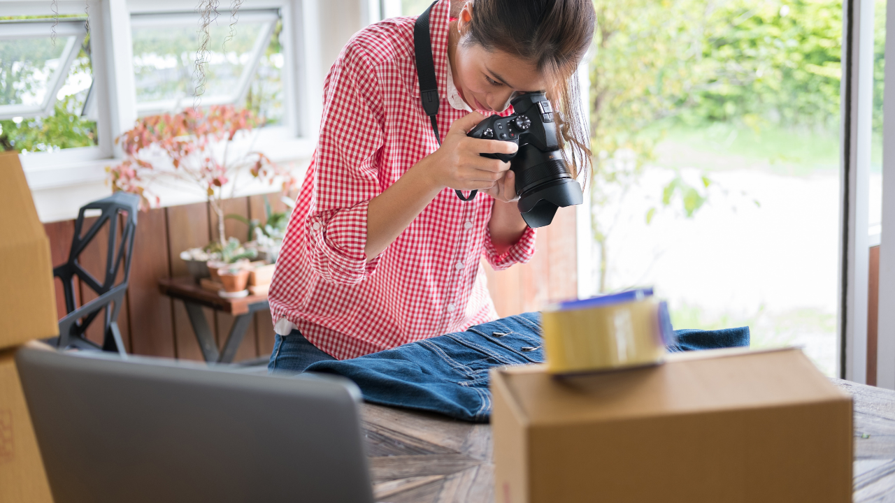a women taking photos of items she is selling your craft online