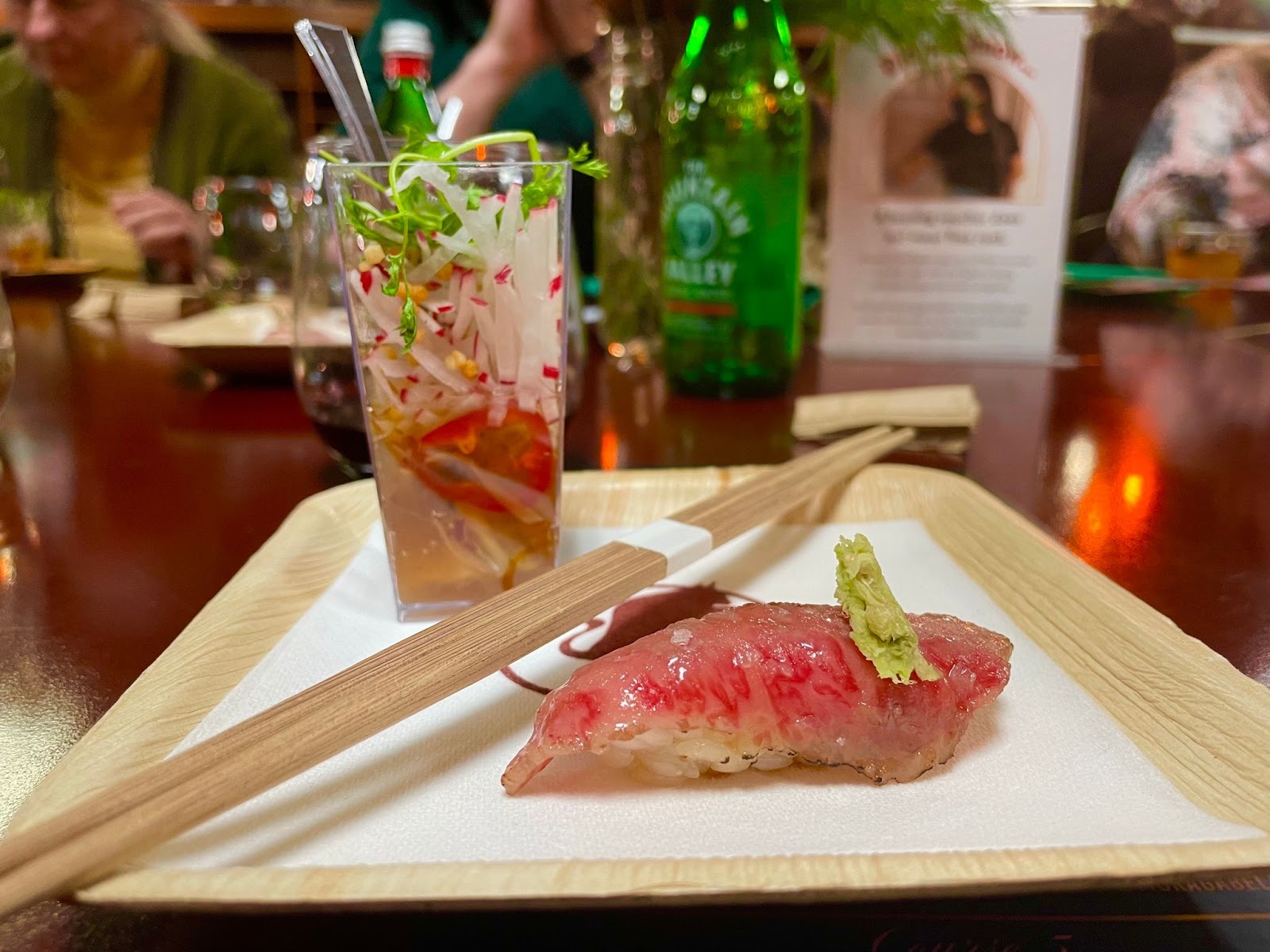 Surf and turf: a hamachi shooter and wagyu nigiri from Alexander's Steakhouse in Pasadena.