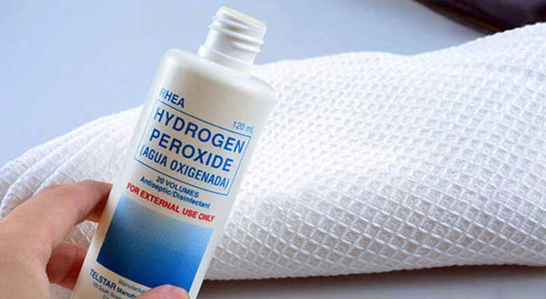 Oxy già tẩy mốc quần áo