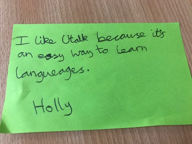 Green post-it reads: I like uTalk because it's an easy way to learn languages. Holly.