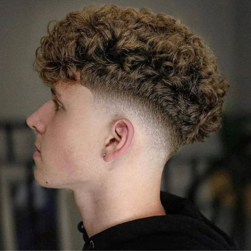 a guy's side profile showing his hairstyle