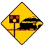 Warning Sign Level crossing ahead, with lights
and barriers