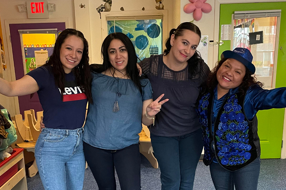 casa teacher Ms. Maribel with fellow staff members on class colors day