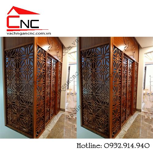 Trang trí vách ngăn cnc gỗ giữa phòng khách và bàn thờ