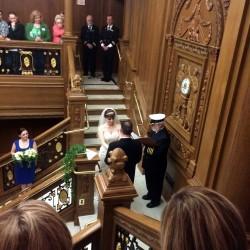 A bride and groom on the stairs

Description automatically generated with low confidence