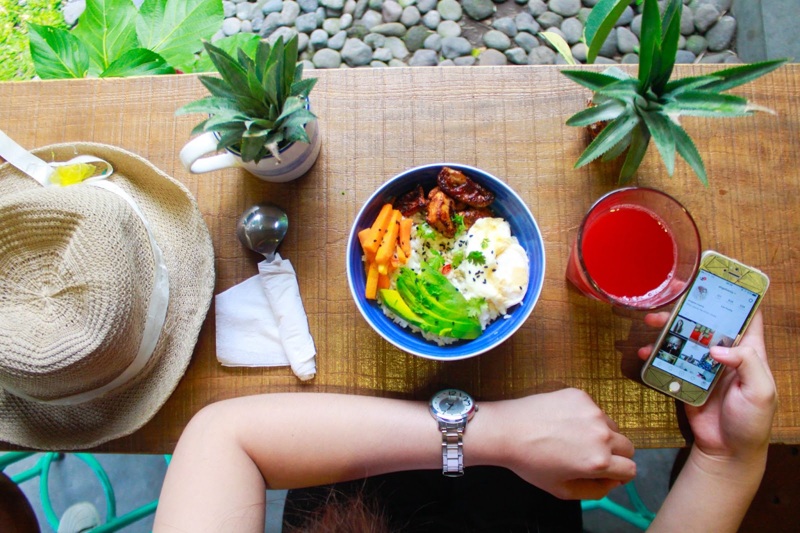 person scrolling on phone while eating a healthy meal, lifestyle, food, health, nutrition