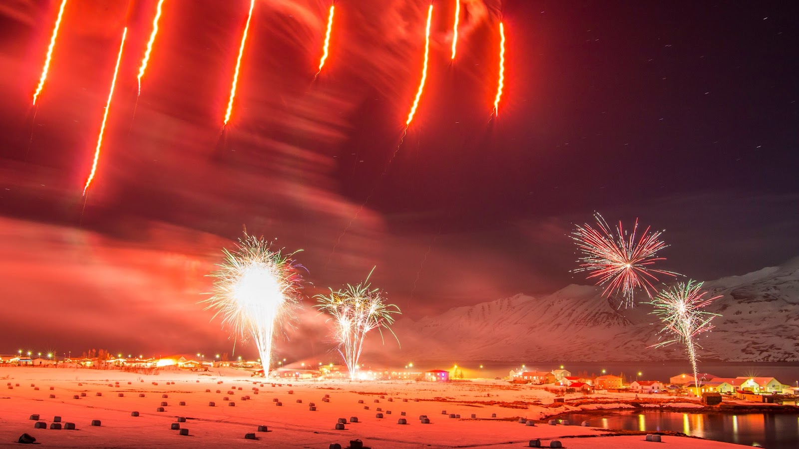 New Year’s fireworks over the town of Hauganes in Iceland