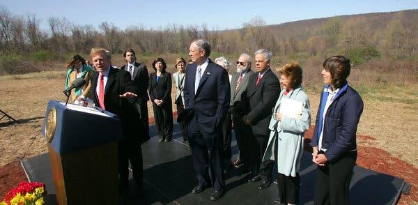 Donald J. Trump in 2006 with George E. Pataki, then governor of New York. A donation of land he was abandoning helped reduce his tax bill.