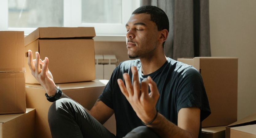 a man meditating on how to make moving easier