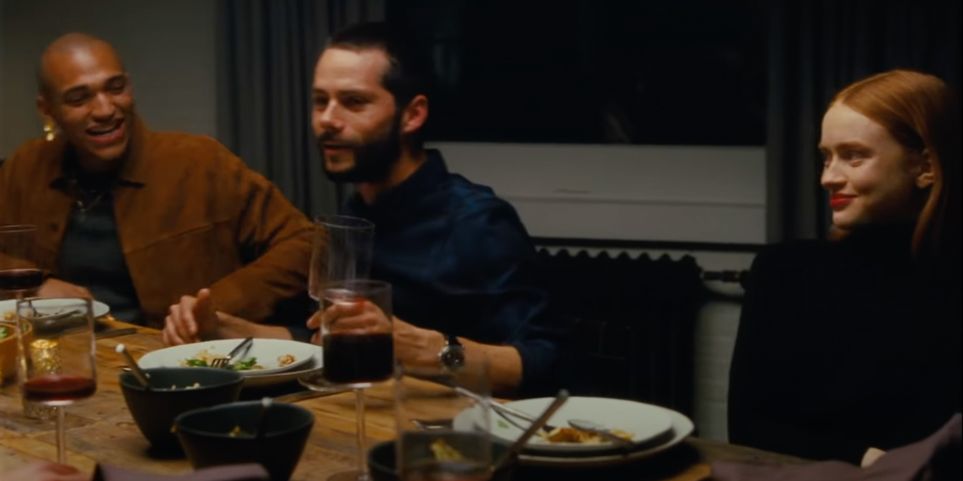The dinner party in the All Too Well: The Short Film
