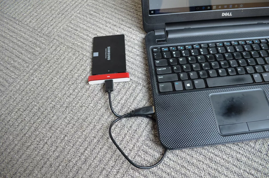 Put your new SSD drive in a USB hard drive case