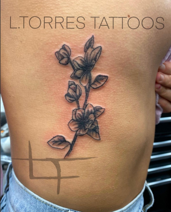 Flower Themed Rib Tattoos 9
