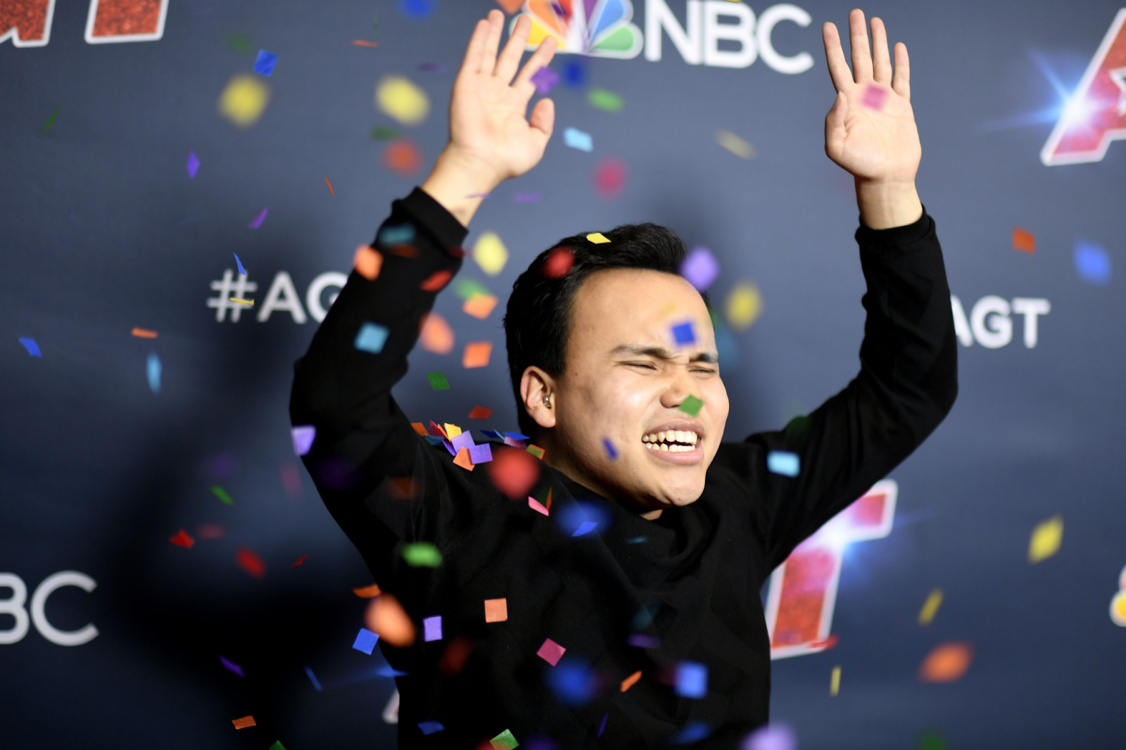 Kodi Lee after winning AGT with confetti in the air.