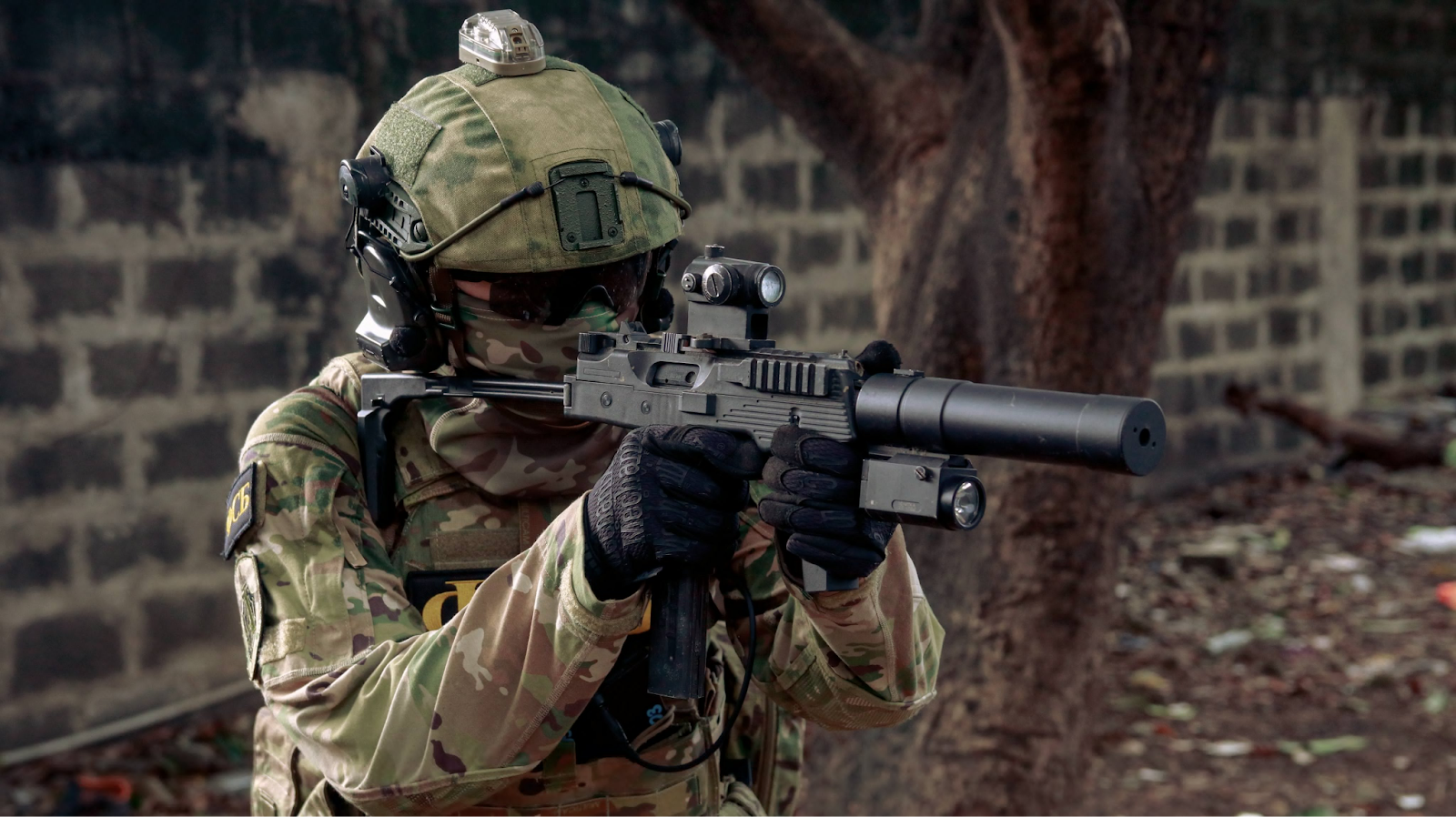 FSB Alpha individual holding a MP9 SMG