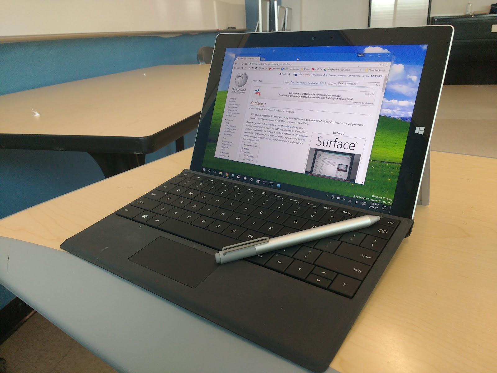 Microsoft Surface Pro 8 Laptop with surface slim pen 2 is on the laptop desk. Display is on of the laptop.