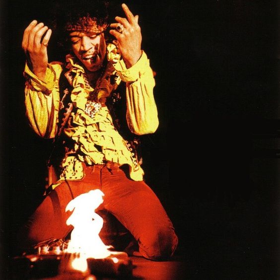 Image result for jimi hendrix guitar on fire