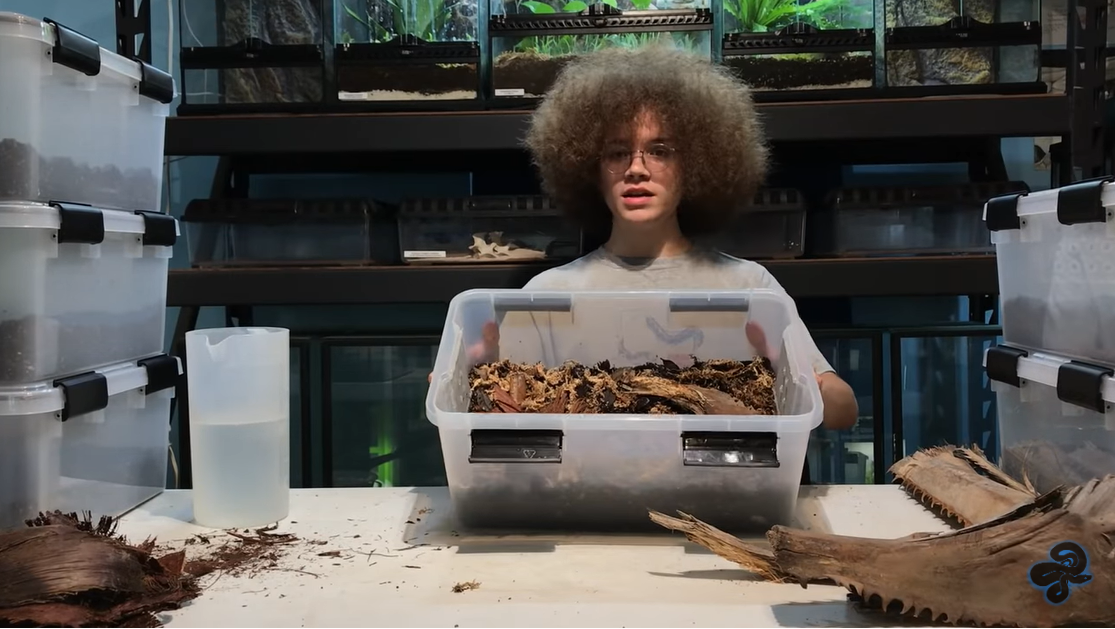 Daniel Carter holding completed isopod breeding habitat