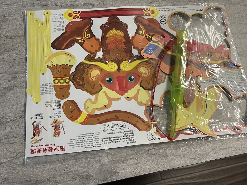 A plastic bag with a toy in it

Description automatically generated with medium confidence