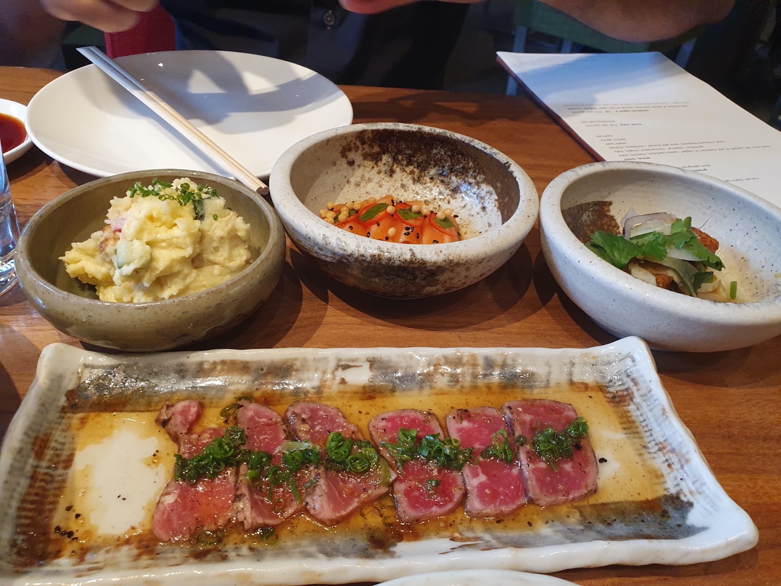 Zuma beef tataki, fried tofu, salmon bites, and Japanese mashed potatoes