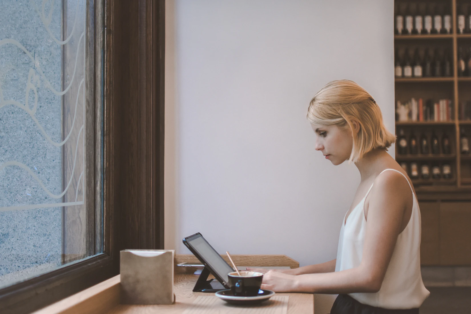 A woman working from a remote location.