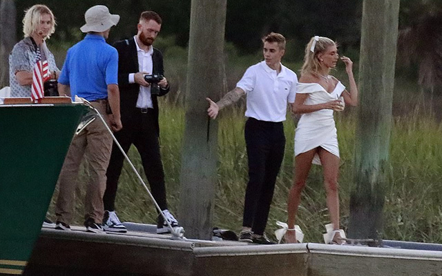 Close-up of the couple getting off the yacht