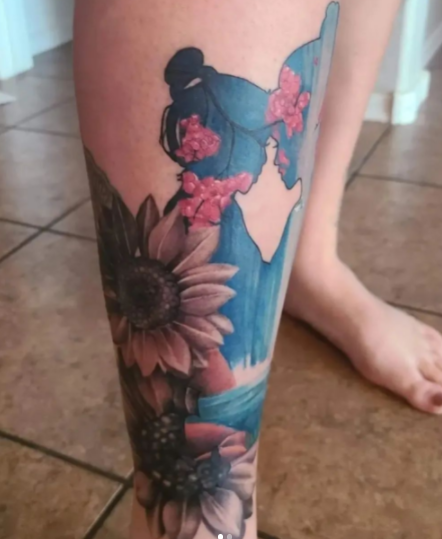Blue And Pink Sunflower Tattoo Design On Leg