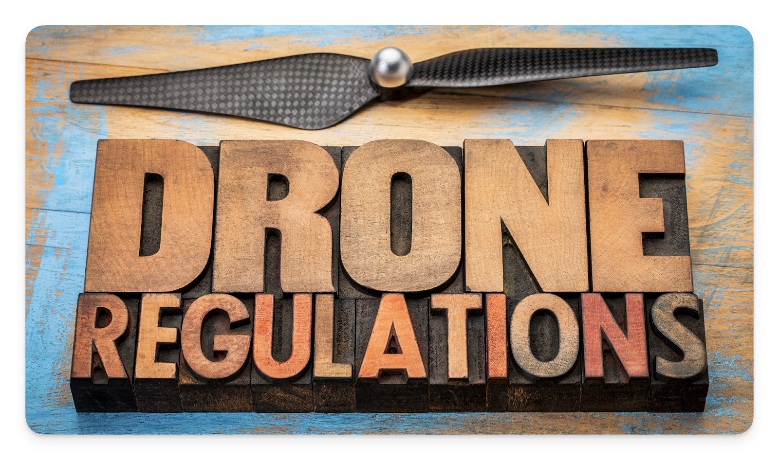 A board with the words "Drone Regulations" on it.
